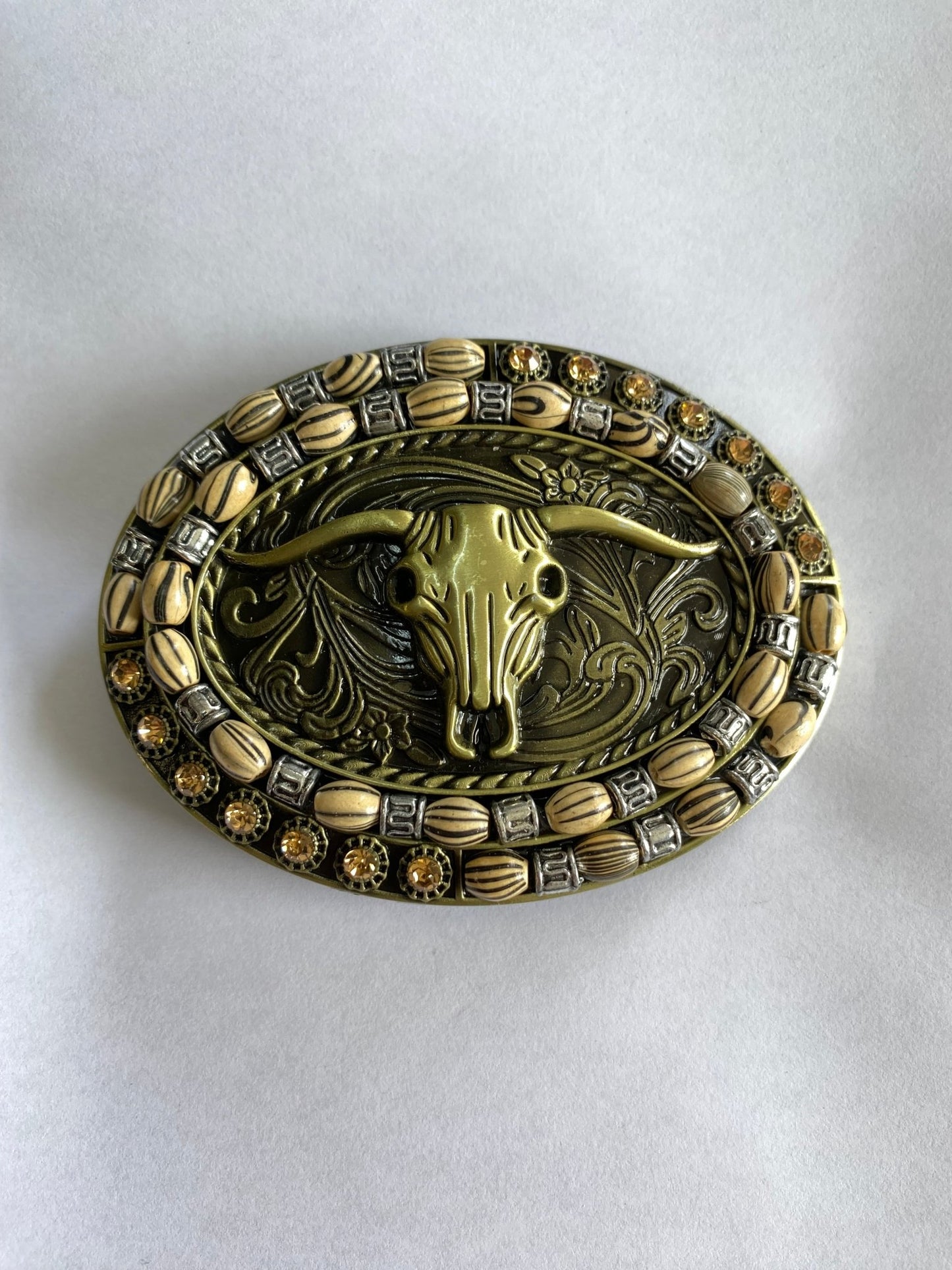 Zdobiona klamra- czaszka byka